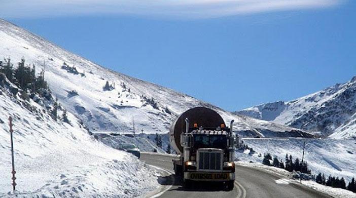 Truck with chains on Interstate 70