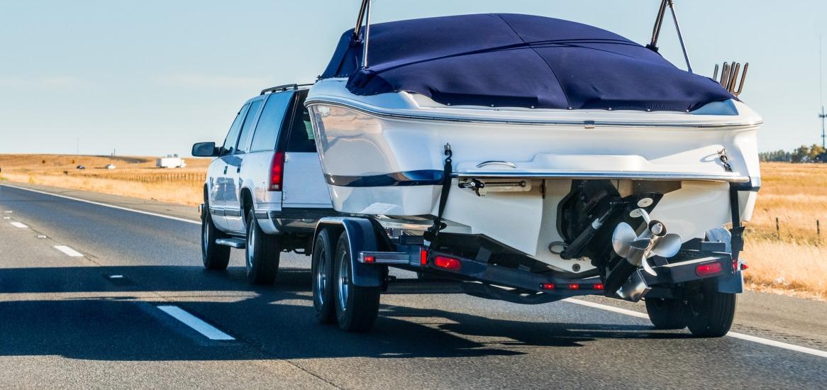 suv hauling a boat